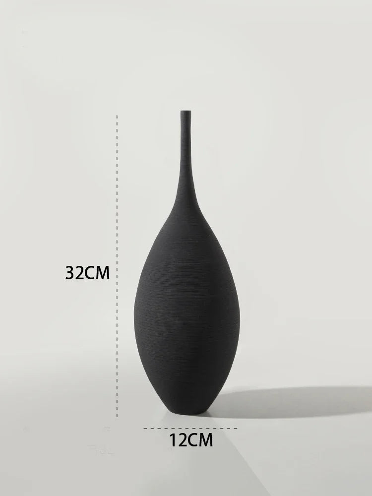 black teardrop ceramic vase, reference photo