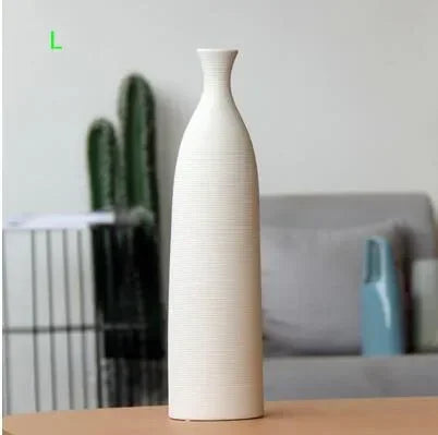white ribbed ceramic bottle vase, reference photo