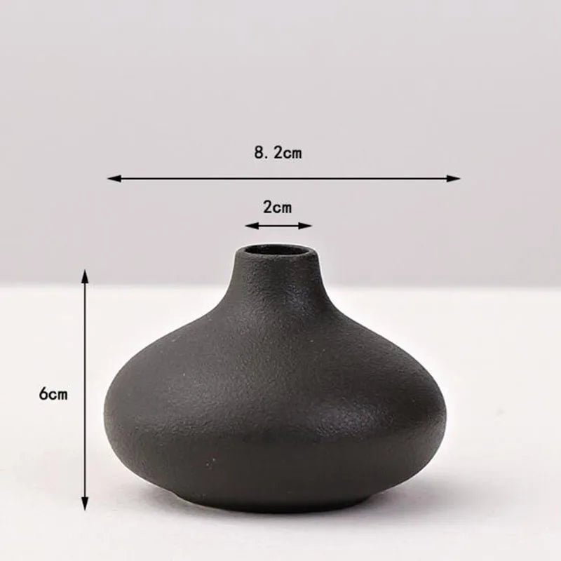 black squat ceramic bud vase, reference photo
