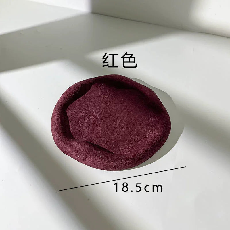 round pebble trinket dish, burgundy, reference photo
