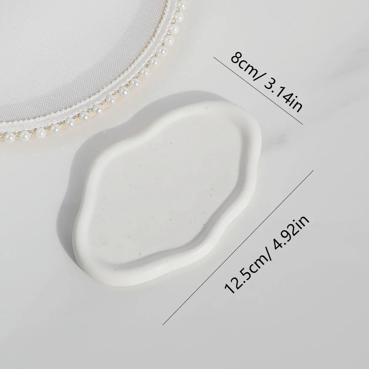 white oval ceramic trinket dish, reference photo