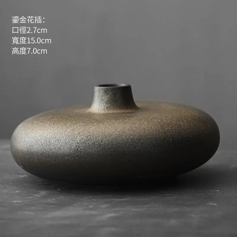 low disc ceramic vase, bronze, reference photo