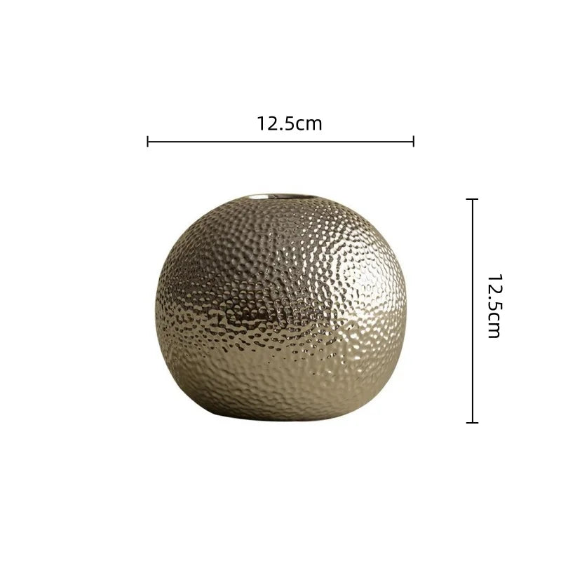 hammered sphere ceramic vase, silver medium, reference photo
