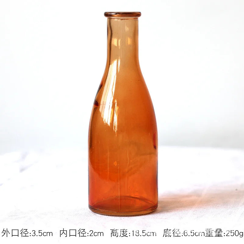 slender glass bottle bud vase, orange, reference photo