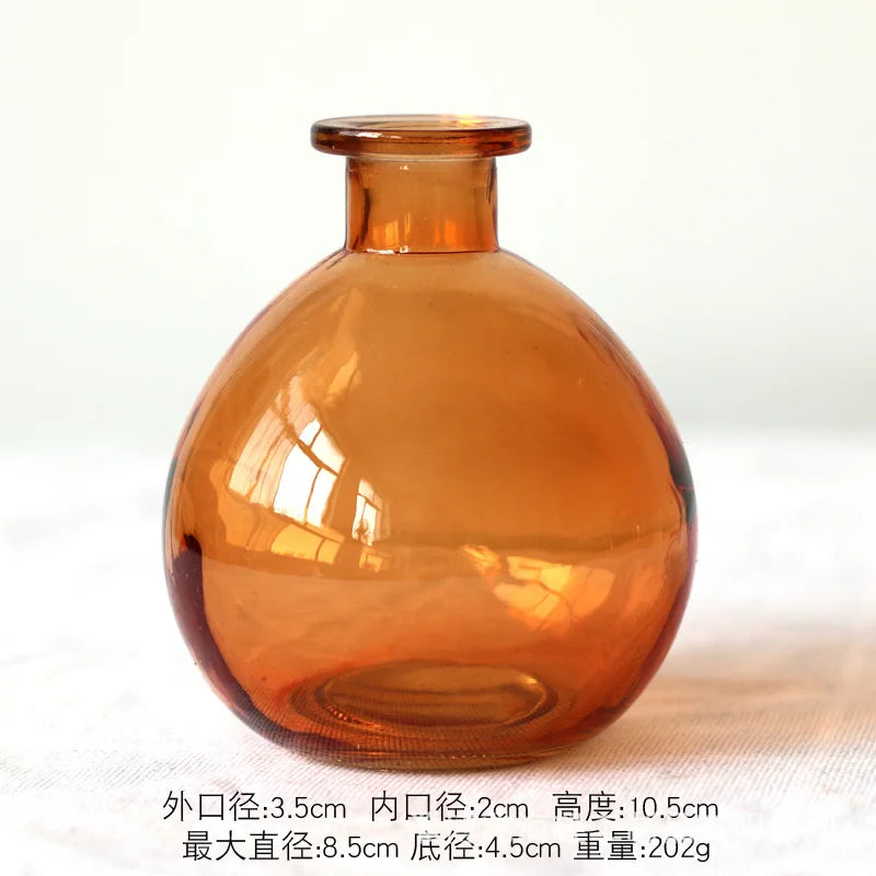 round glass bud vase, orange, reference photo