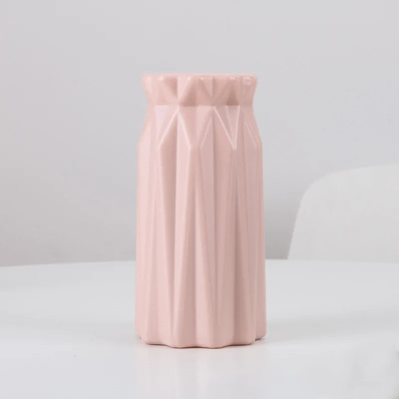 folded origami plastic vase, pink, reference photo
